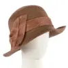 Brown cloche hat with bow by Max Alexander