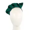 Twisted green felt winter racing fascinator by Max Alexander