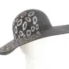 Wide brim charcoal winter cloche hat by Cupids Millinery Melbourne