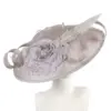 Large silver sinamay fascinator by Max Alexander