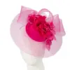 Custom made fuchsia cocktail hat with flowers